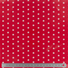 Charger l'image dans la galerie, Tissu Fryett's enduit étoile blanche fond rouge 100 % coton et PVC 132 cm