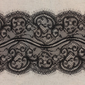 Rouleau dentelle jacquard noir 15 cm X 15 mètres.