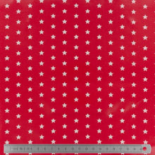 Charger l&#39;image dans la galerie, Tissu Fryett&#39;s enduit étoile blanche fond rouge 100 % coton et PVC 132 cm
