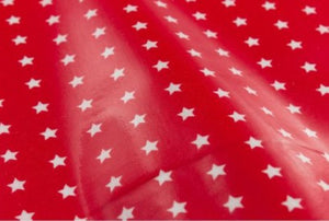 Tissu Fryett's enduit étoile blanche fond rouge 100 % coton et PVC 132 cm