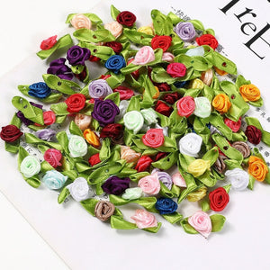 Lot de 50 mini roses en soie avec noeud  2cm/15 couleurs.