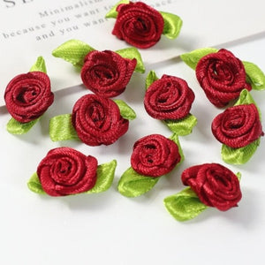 Lot de 50 mini roses en soie avec noeud  2cm/15 couleurs.